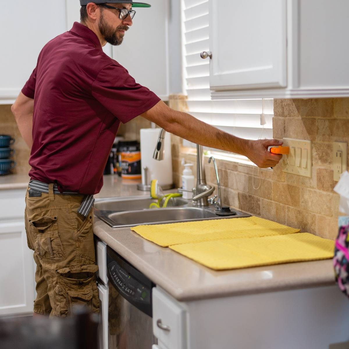 Home-Inspector-Examines-Electrical-Outlets-During-11-Month-Warranty-Inspection